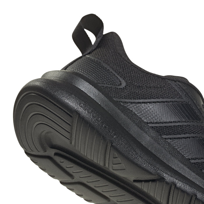 Close-up of youth black running shoe heel with padded collar and treaded sole edge