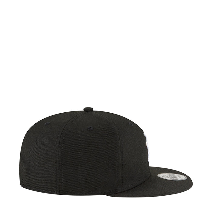 Black baseball cap side profile with curved brim