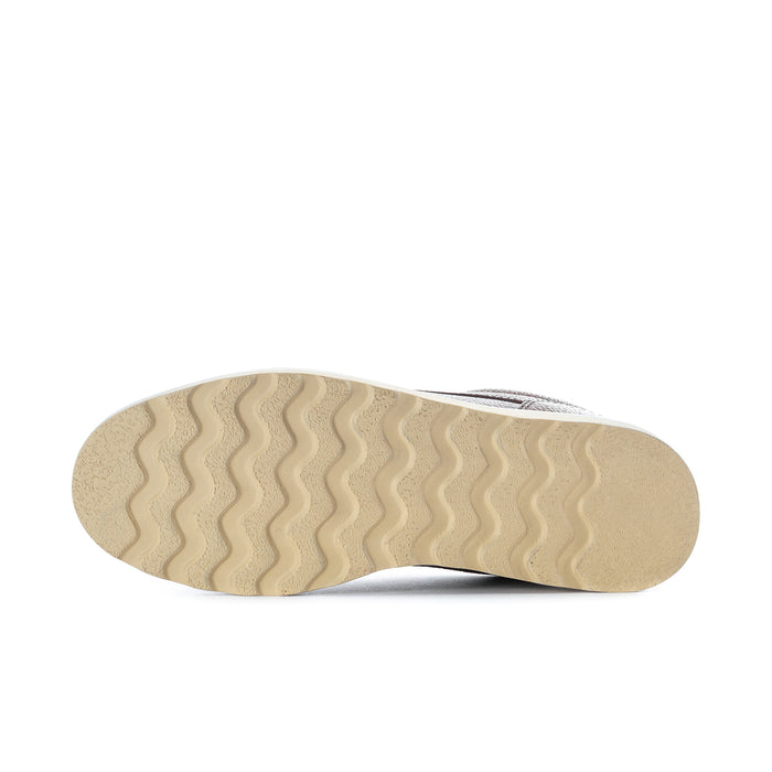 Men's tan rubber outsole with textured tread for traction