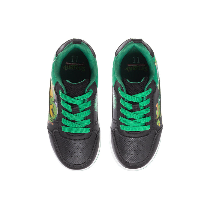 Kids TMNT court sneaker showing green laces and “Turtles” text on insole