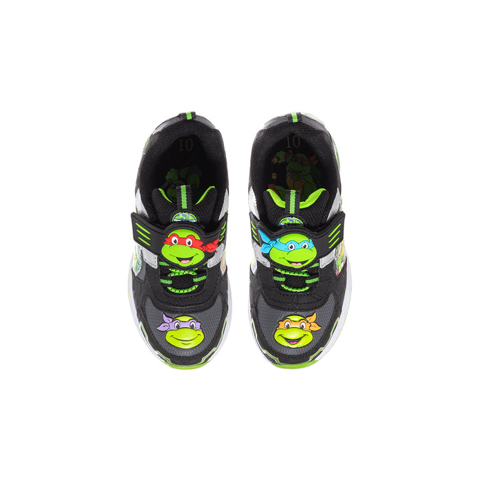 Toddler light-up sneakers, black with neon green laces and TMNT-style character logos