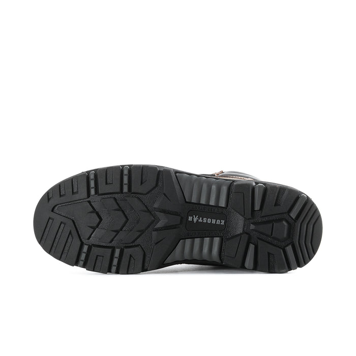 Outsole tread of brown steel-toe work boots in black rugged rubber pattern