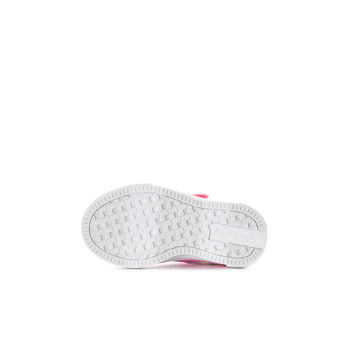 Toddler sneaker outsole tread with white rubber sole and pink edge trim