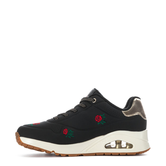 Black lace-up sneaker with gold-capped air window, rose embroidery and white sole