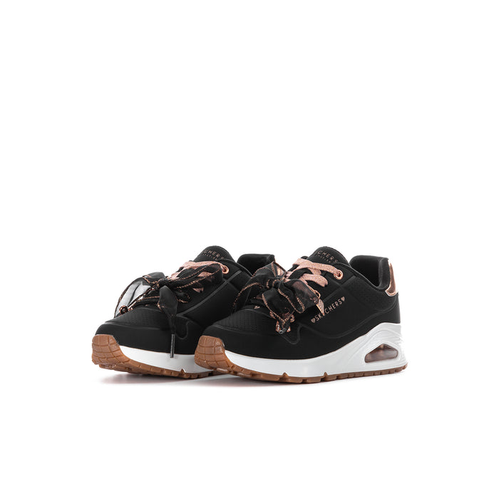 Kids' Skechers sneakers, black uppers with rose-gold lace accents, white air-cushion sole