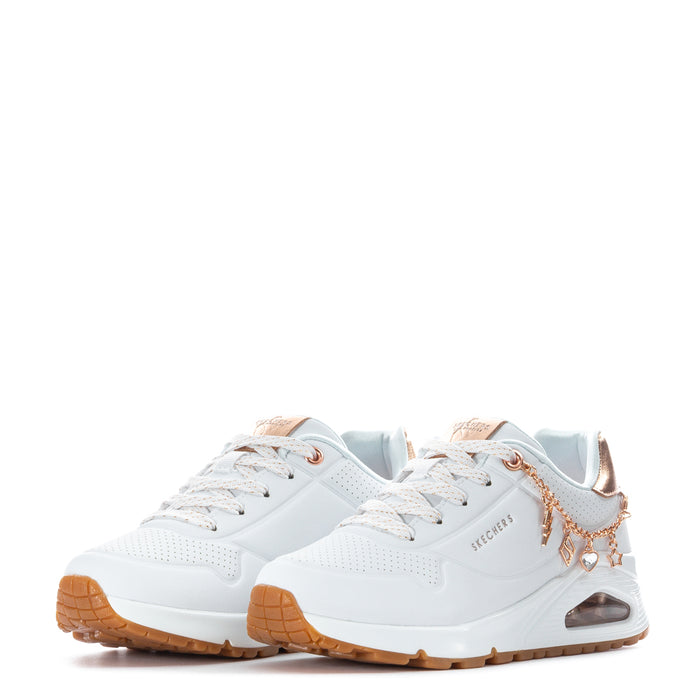 Pair of kids' white sneakers with rose-gold chain detail and lace-up front