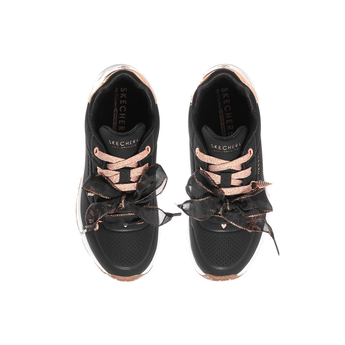 Kids' Skechers sneakers pair, black with rose-gold heart lace detail and breathable toe