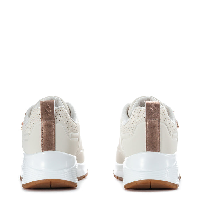 Kids white sneaker heel view with taupe back strap and tan sole