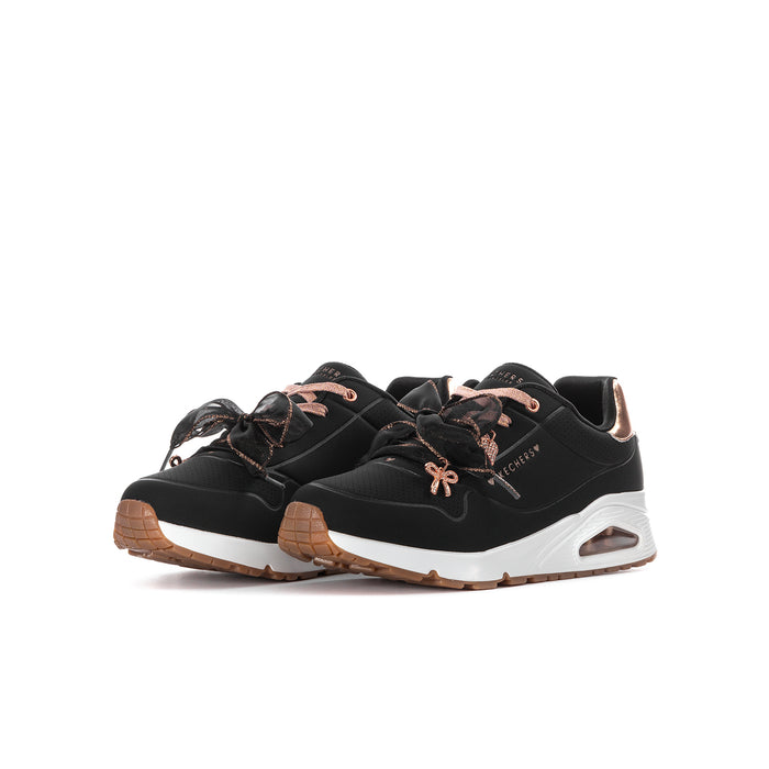 Youth black sneakers with rose-gold laces, white midsole, and brown tread outsole