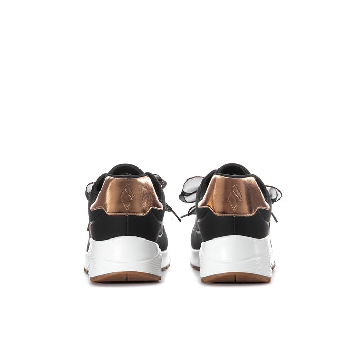 Youth black sneakers with rose-gold heel panels and white midsole