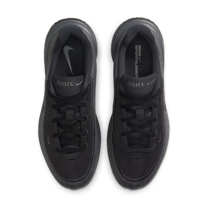 Women's black lace-up sneakers, top view showing mesh texture and Nike on insoles