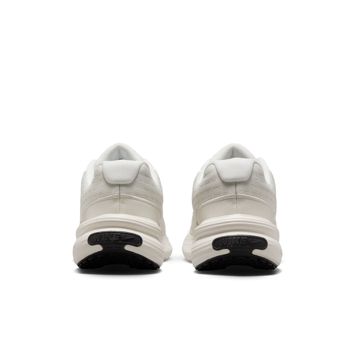 Women's lace-up shoes, back view with heel tab and dark outsole inserts