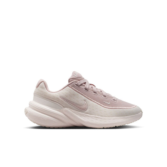 Youth running sneaker in light pink with cream sole and mesh upper, side swoosh detail