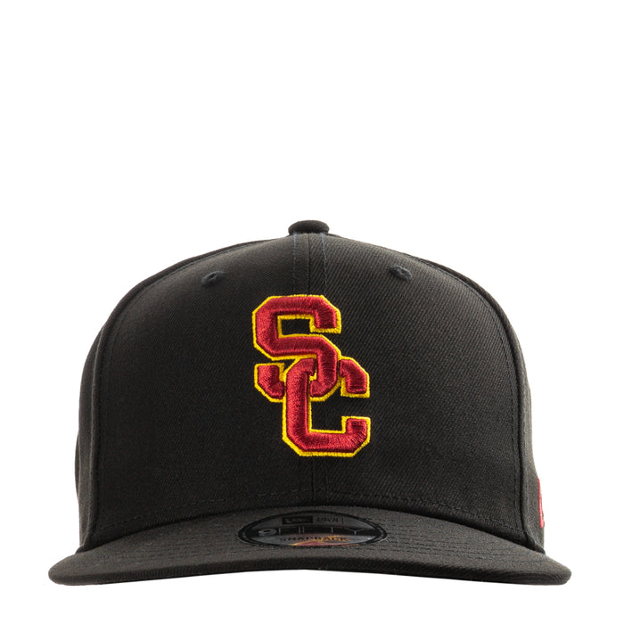 Black baseball cap with embroidered USC logo in red and yellow at front
