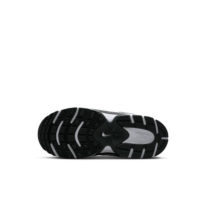 Kids Nike sneaker outsole, black tread with gray edge and white rocker sole