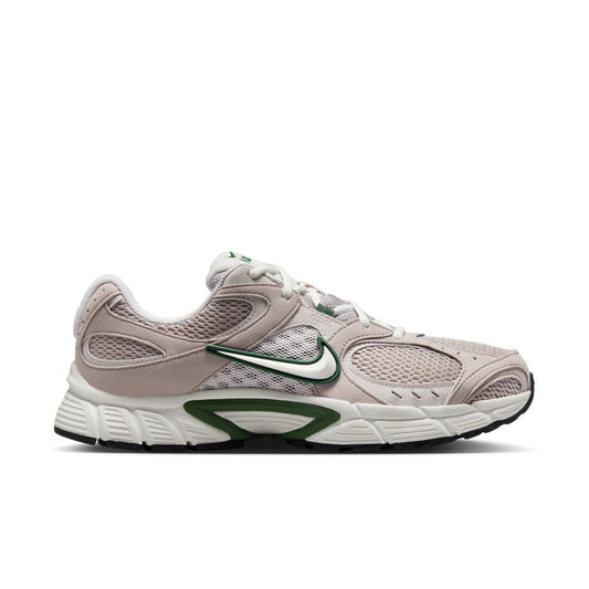 Men's light gray running shoes with green swoosh and white midsole