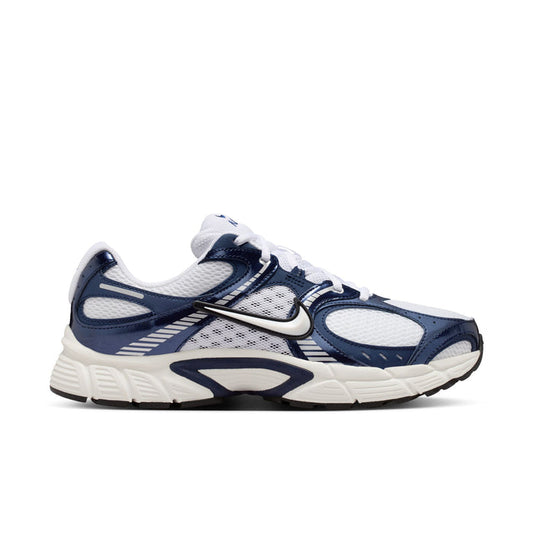 Mens running sneakers in white and midnight navy with NIKE swoosh and lace-up design