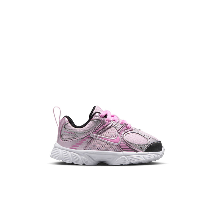 Toddler running shoe in light pink and metallic silver with pink laces and black accents