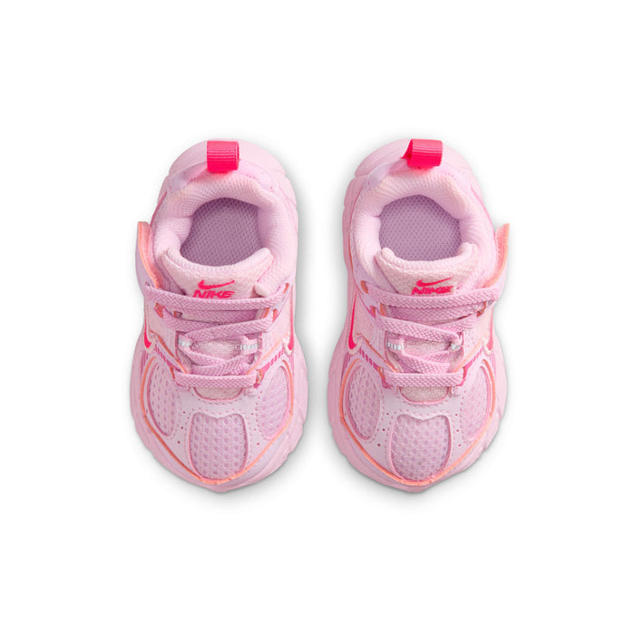 Toddler pink sneakers, front view showing laces, padded tongue, and breathable mesh panels