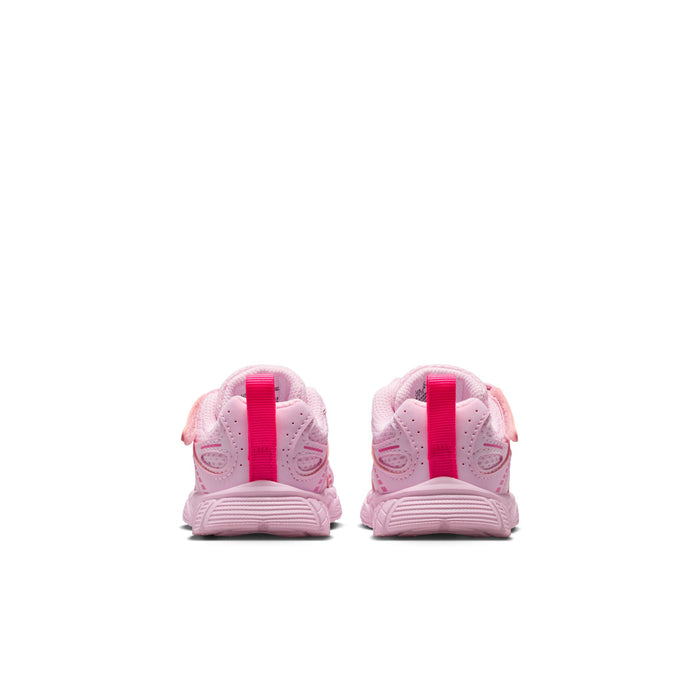 Toddler pink sneakers from the back, with heel tabs and textured rubber sole