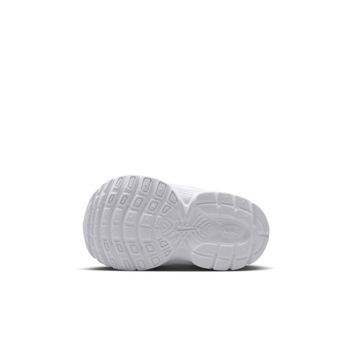 Toddler running shoe outsole view with textured white rubber tread