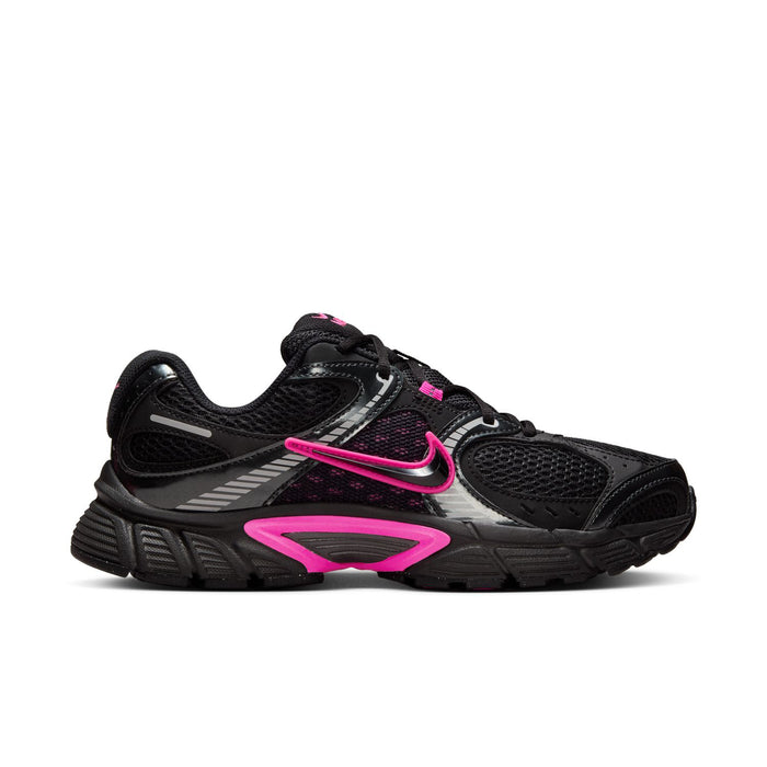 Women's black running shoes with pink accents, lace-up, padded tongue, Nike swoosh