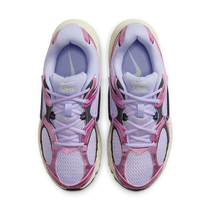 Women’s lace-up running shoes showing padded light purple tongue and Nike Swoosh accents
