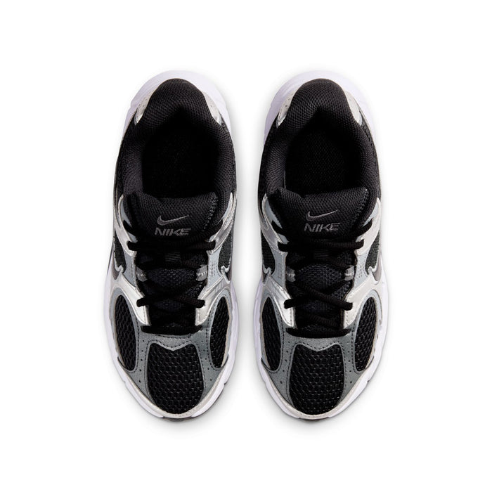 Pair of Nike youth sneakers showing black interior lining and lace-up forefoot