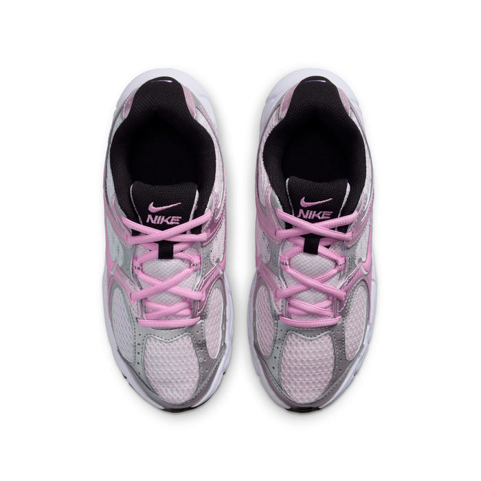 Youth running shoes, front interior view with pink laces and black lining