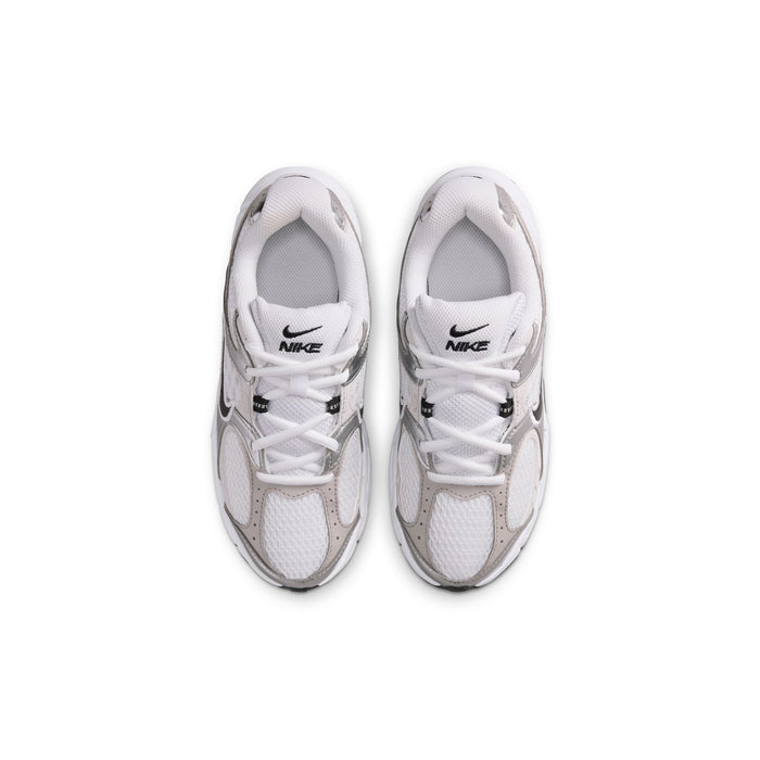 Youth sneakers shown from front toe view; white and light gray with Nike branding
