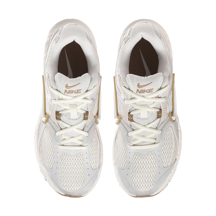 Women’s athletic sneaker pair viewed from the front, white mesh with tan liners