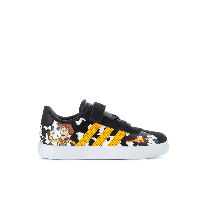 Kids' black lace-up sneakers with cow-print panels, yellow stripes, character graphics