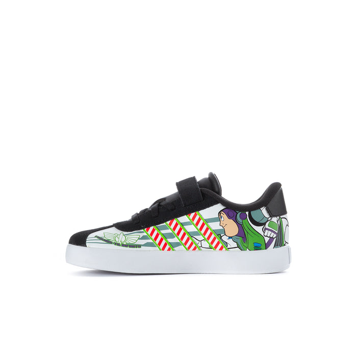 Kids' black sneakers with cow-print sides, green character panel, white rubber sole