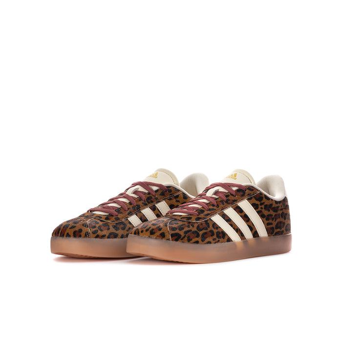 Youth leopard-print low-top sneakers with white adidas-style stripes and burgundy laces