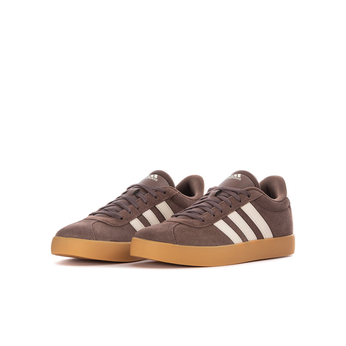 Youth sneakers, pair shown, dark brown suede with cream three-stripe design and gum sole.