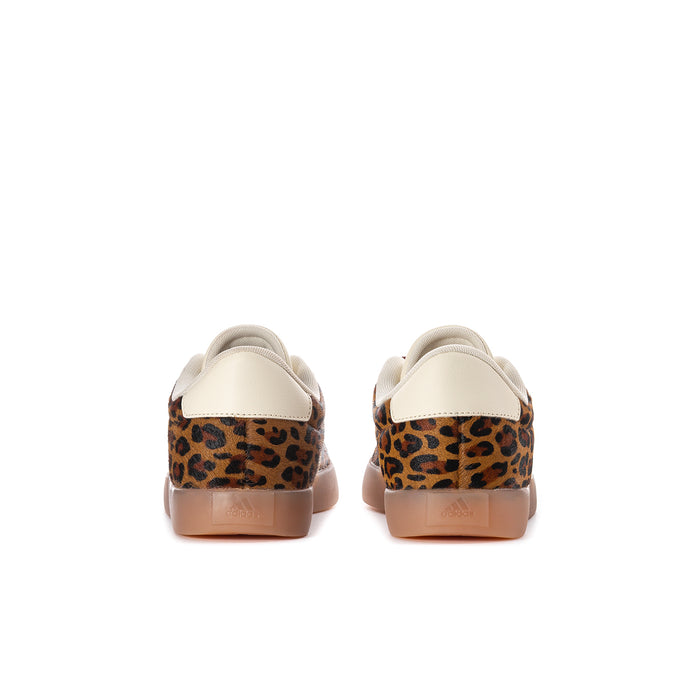 Youth low-top sneakers, rear view: leopard-print heel with cream back tab and gum sole