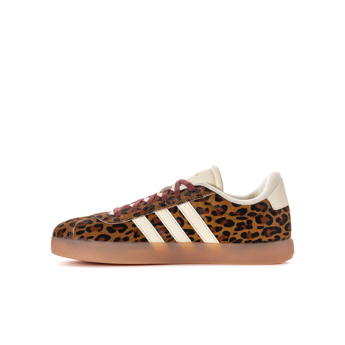 Youth leopard-print sneakers with white stripes, burgundy laces, and tan rubber sole