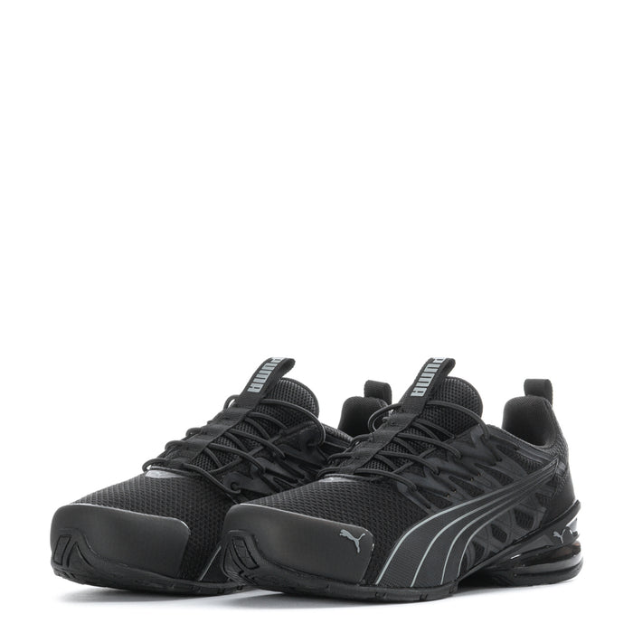 Kids black running shoes with mesh upper and cushioned sole, front view
