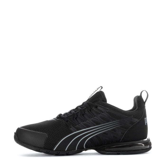 Youth black Puma sneakers, mesh upper with gray stripes and padded heel collar
