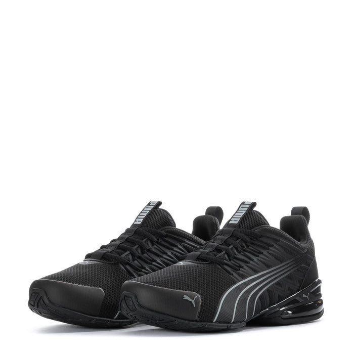 Youth black Puma sneakers pair view with gray graphics and lace-up forefoot