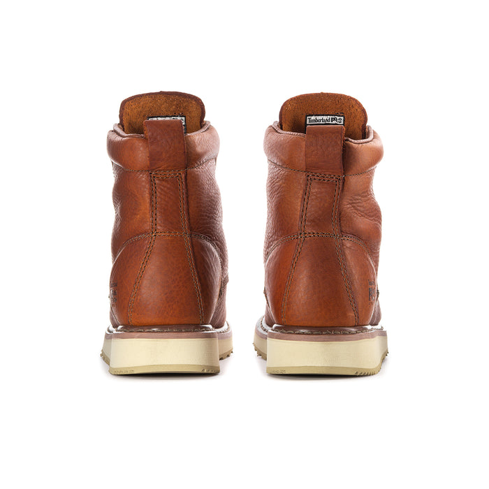 Men's rust lace-up ankle boots with heel tab and light rubber sole.