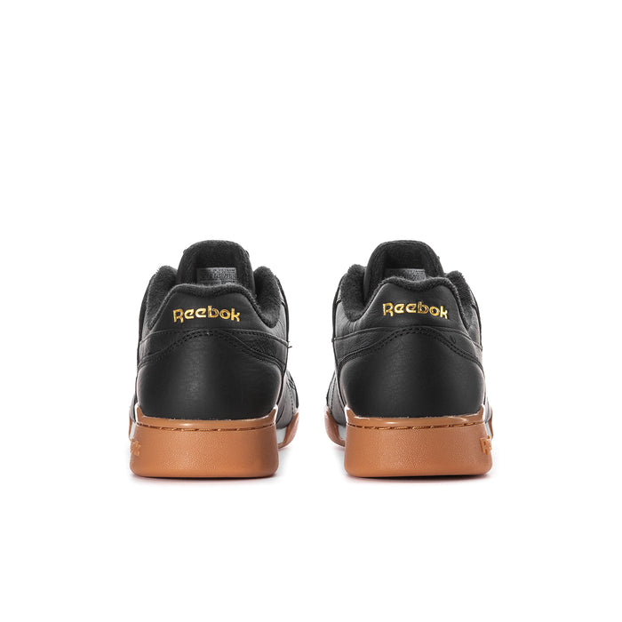 Men's black Reebok sneakers, rear logo and tan gum heel accent