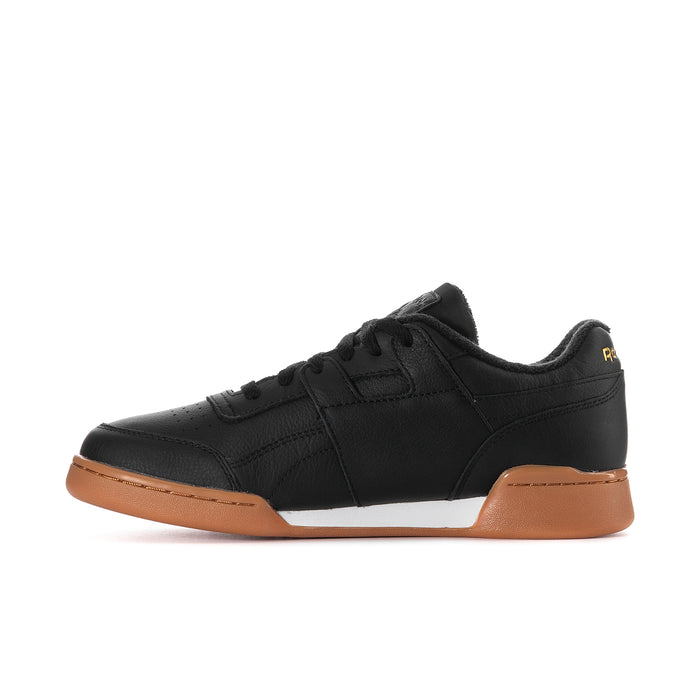 Men's black Reebok low-top sneakers with lace-up front and gum sole