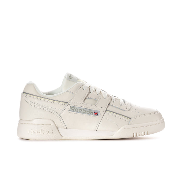 Women’s off-white lace-up sneakers with light blue trim and Reebok tongue label