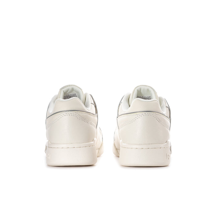 Women’s off-white sneakers, back view with padded collar and heel tab