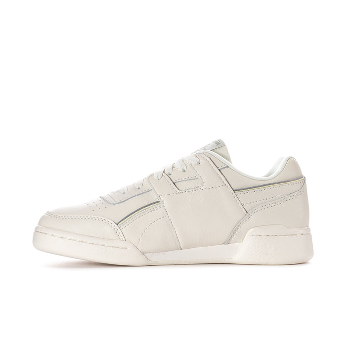 Women’s off-white sneakers with light blue side stripes and lace-up front