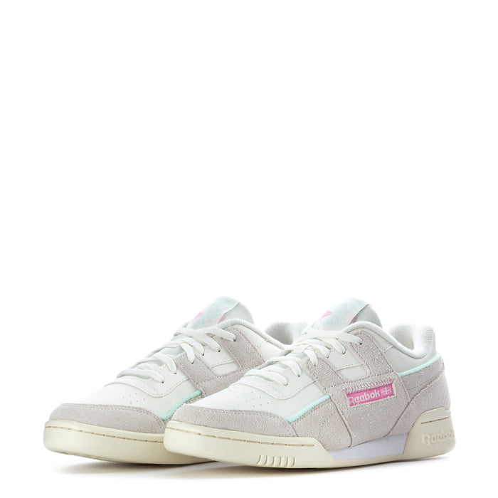 Youth Reebok sneakers with white laces, light gray suede-look panels, and mint accents