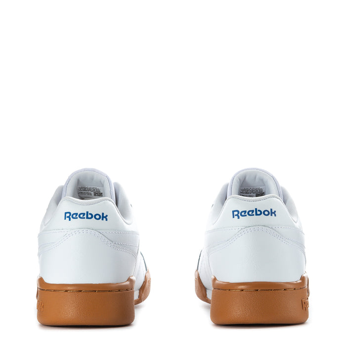 Back view of white youth Reebok lace-up sneakers with gum heel and rear logo.