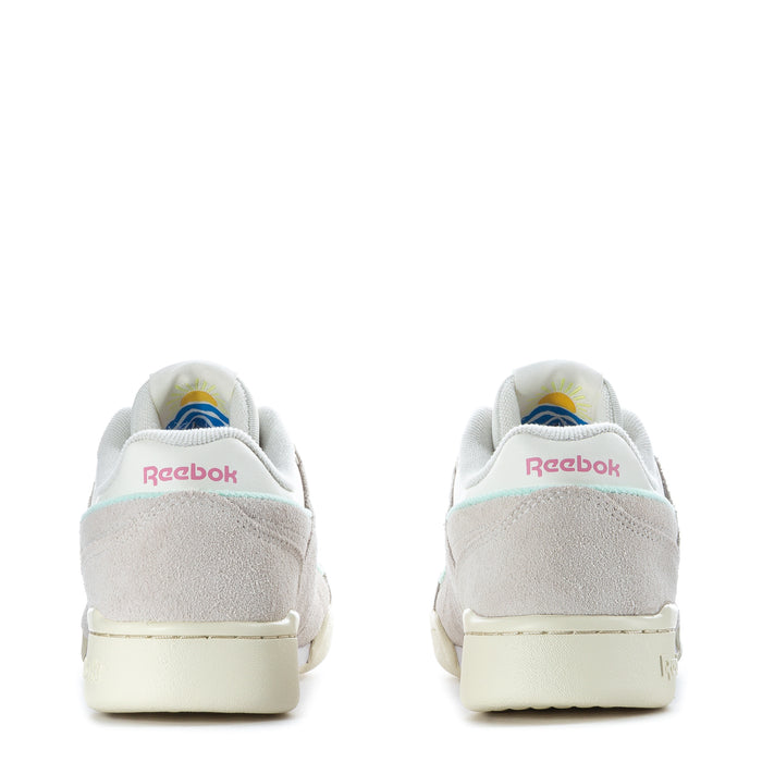 Youth sneakers heel view with Reebok logo, light gray suede upper, and cream midsole