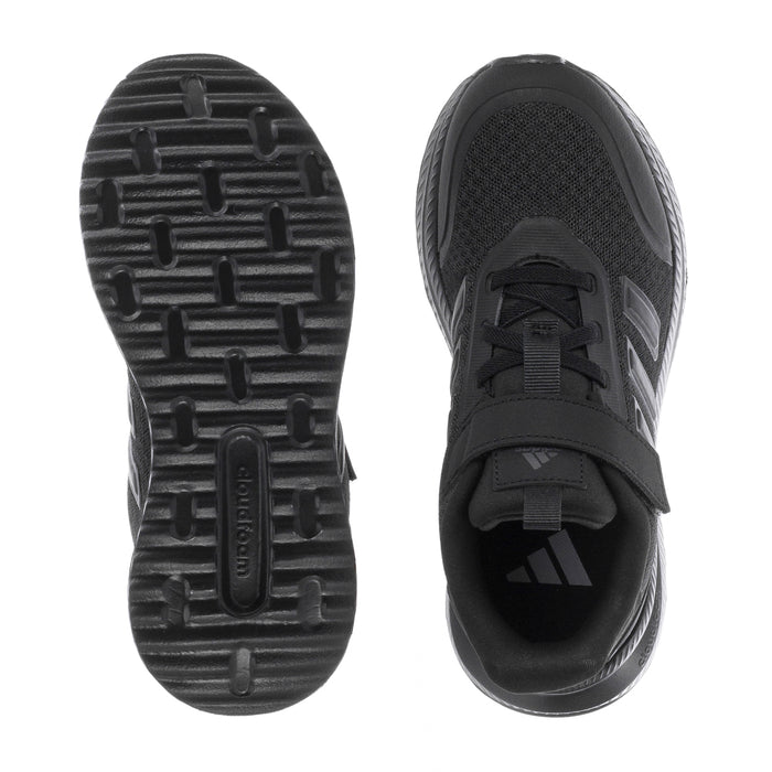 Kids sneaker outsole tread and black side profile with velcro strap